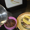 Adding boiling water to dehydrated dinner.